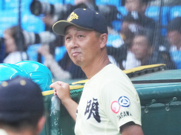 英明を率いる香川純平監督　photo by Ryuki Matsuhashi