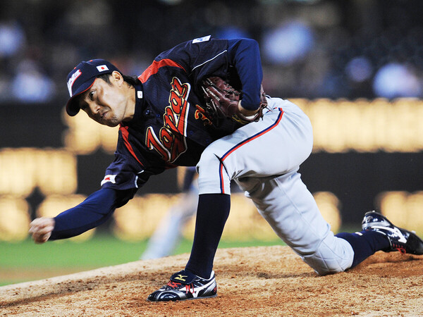 「世界一低いアンダースロー」と称され、２度のWBCで好投した渡辺俊介氏　photo by AFLO