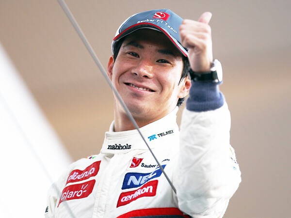 2012年の日本GPで表彰台に立った小林可夢偉　photo by BOOZY