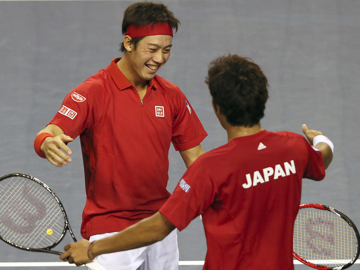 2014年のデビスカップ（カナダ戦）でダブルスを組んだ錦織圭と内山靖崇氏photo by Nikkan sports/AFLO
