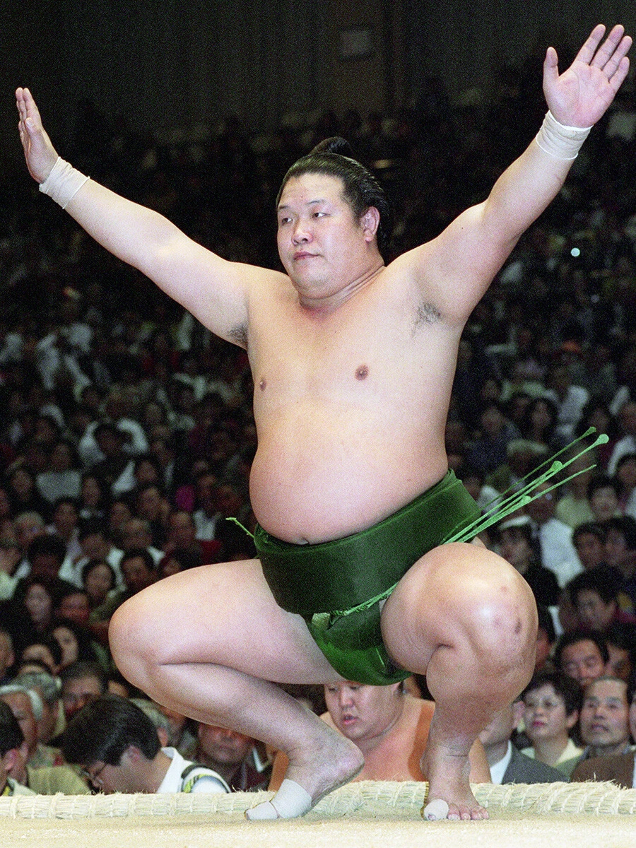 強烈な張り手で上位陣に立ち向かう剣晃の相撲は、ファンの心に刻まれている　photo by Jiji Press